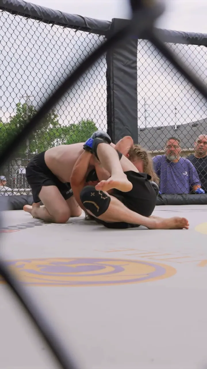 Nathan Johnson and Kyle Schultz scrambling on the mat at his LFS debut